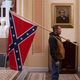 Illustration for article titled More Capitol Rioters Arrested, Including Man Pictured With Confederate Flag Inside Capitol Building